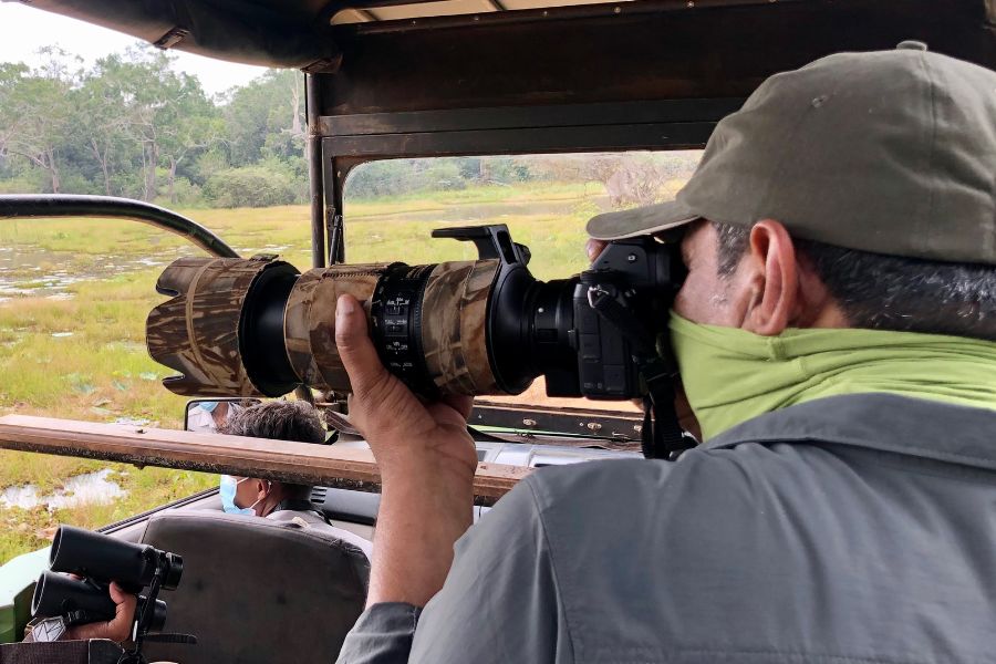 Capturing photographs during their safari in Sri Lanka